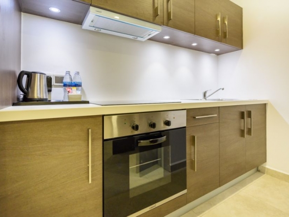 the kitchen of the 1-bedroom luxury serviced apartment for rent in BKK1 in Phnom Penh