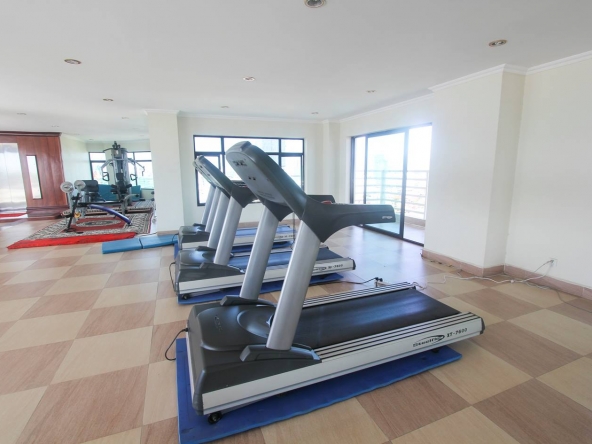 the gym of the 1-bedroom luxury spacious serviced apartment for rent in BKK1 in Phnom Penh in Cambodia