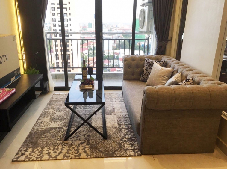 the living room of the luxury serviced 1-bedroom apartment for rent in BKK1 in Phnom Penh Cambodia