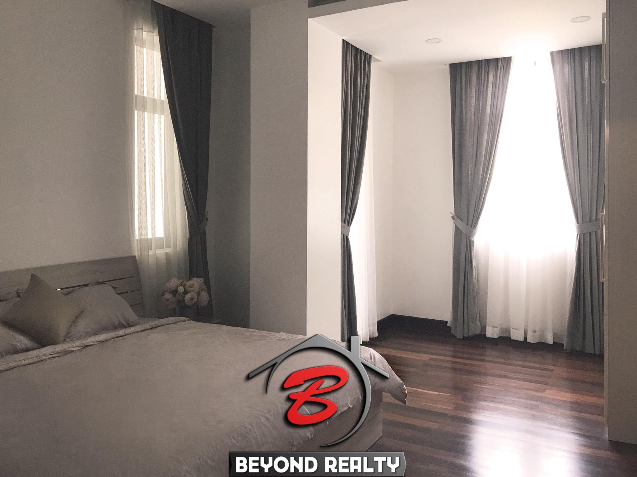 the bedroom of the 1br luxury serviced condo for rent in Sangkat Srah Chak in Daun Penh in Phnom Penh Cambodia