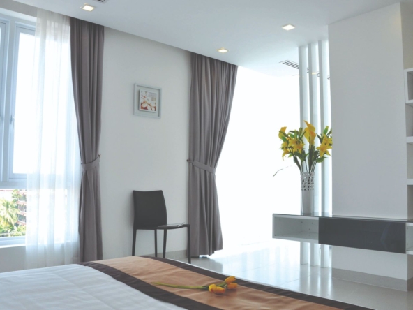 a bedroom of the 2-bedroom luxury serviced apartment for rent in BKK1 in Phnom Penh Cambodia