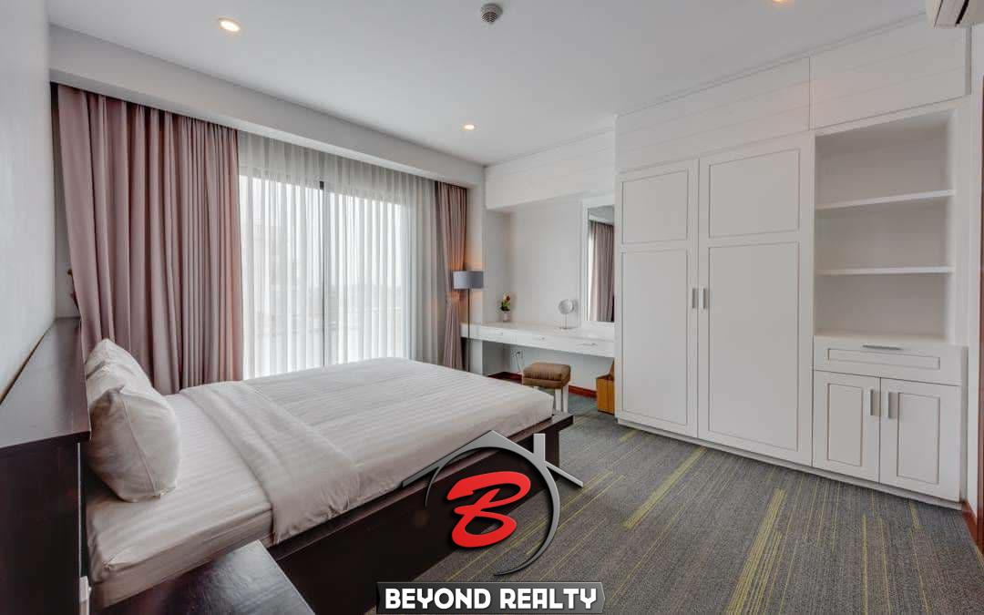 a bedroom of the 2-bedroom spacious beautiful serviced apartment for rent in BKK1 Phnom Penh Cambodia
