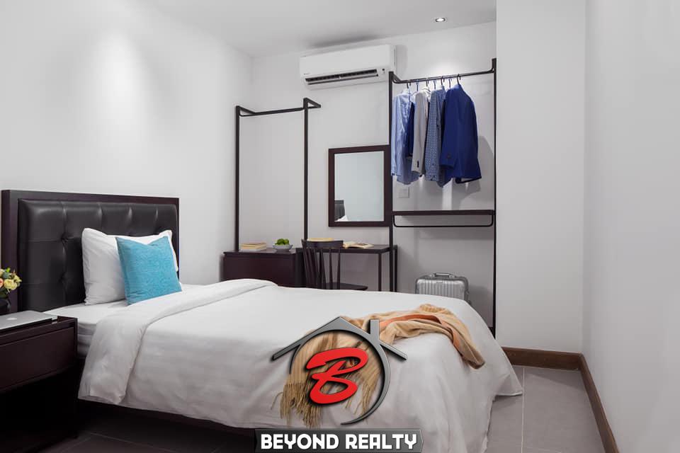 a bedroom of the 2br duplex serviced apartment for rent in Toul Tom Poung in Phnom Penh Cambodia