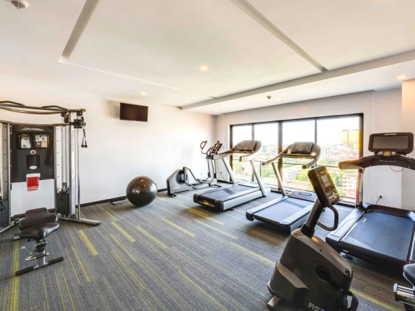 the gym of the 1-bedroom duplex loft serviced apartment for rent in BKK1 in Phnom Penh Cambodia