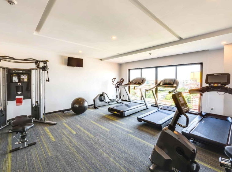 the gym of the 1-bedroom duplex loft serviced apartment for rent in BKK1 in Phnom Penh Cambodia