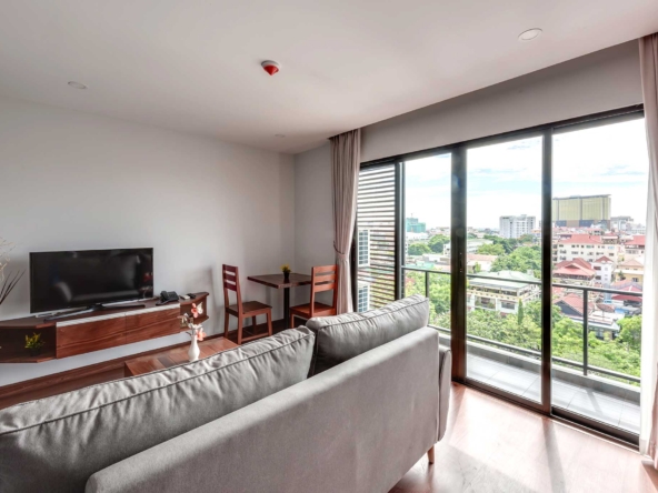 the living room of the 1-bedroom duplex loft serviced apartment for rent in BKK1 in Phnom Penh Cambodia
