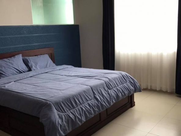the bedroom of the 1-bedroom luxury spacious serviced apartment for rent in BKK1 in Phnom Penh Cambodia