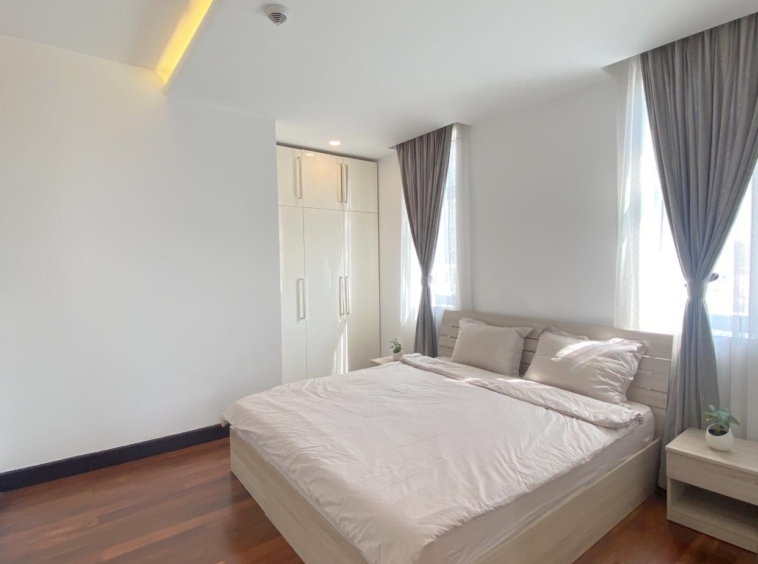 a bedroom of the luxury serviced condo for rent in Sangkat Srah Chak in Daun Penh in Phnom Penh Cambodia