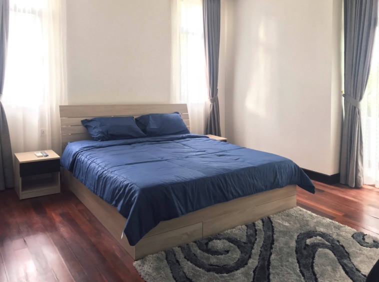 a bedroom of the 2br spacious luxury serviced condo for rent in Sangkat Srah Chak in Daun Penh in Phnom Penh Cambodia