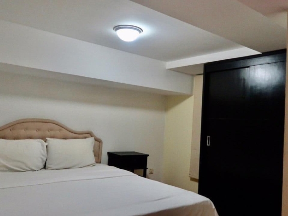 a bedroom of the 3-bedroom serviced apartment for rent near Wat Phnom in Daun penh in Phnom Penh Cambodia