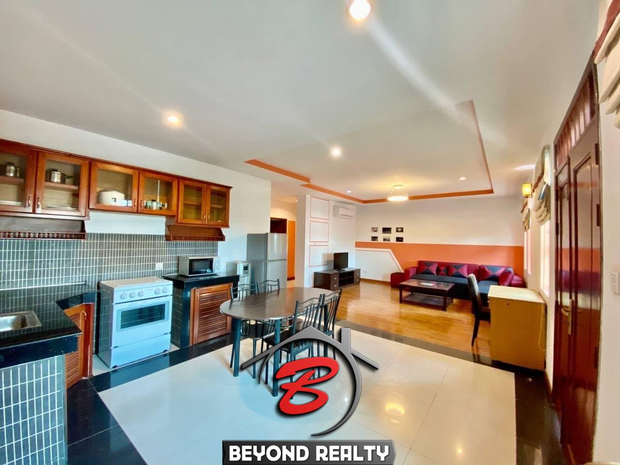 the living room and the kitchen of the 3-bedroom serviced flat for rent near Wat Phnom in Daun penh in Phnom Penh Cambodia