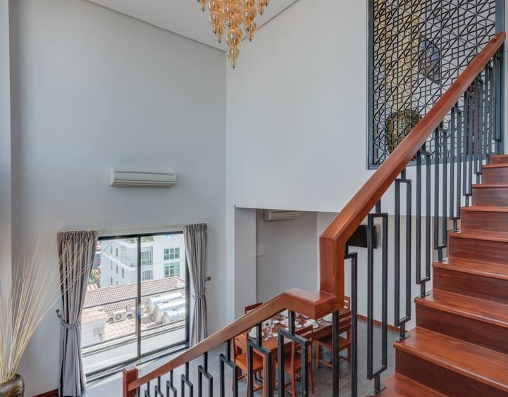 the stairs of the 4-bedroom duplex penthouse for rent in BKK1 in Phnom Penh Cambodia