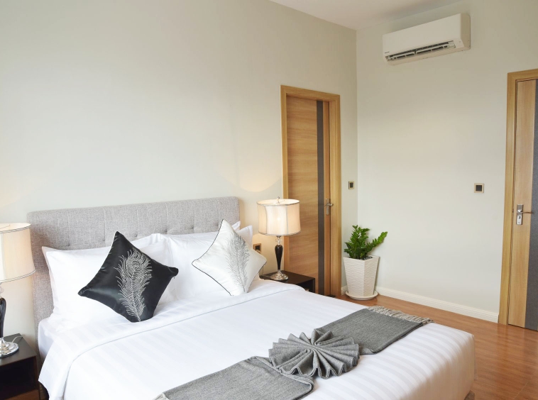 the bedroom of the luxury serviced 1-bedroom apartment for rent in BKK1 in Phnom Penh Cambodia