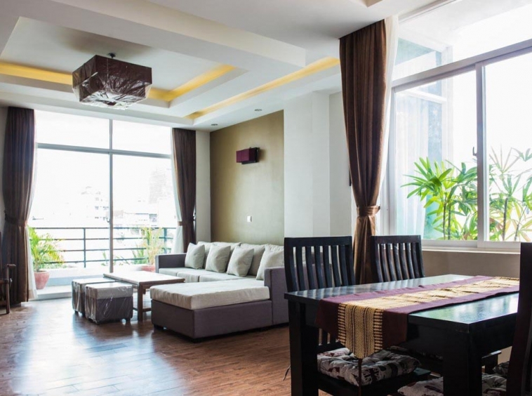 the living room of the 2-bedroom spacious luxury serviced apartment for rent in BKK1 in Phnom Penh Cambodia