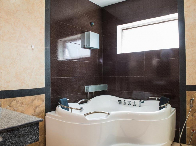 the jacuzzi in a bathroom of the 2-bedroom spacious luxury serviced apartment for rent in BKK1 in Phnom Penh Cambodia