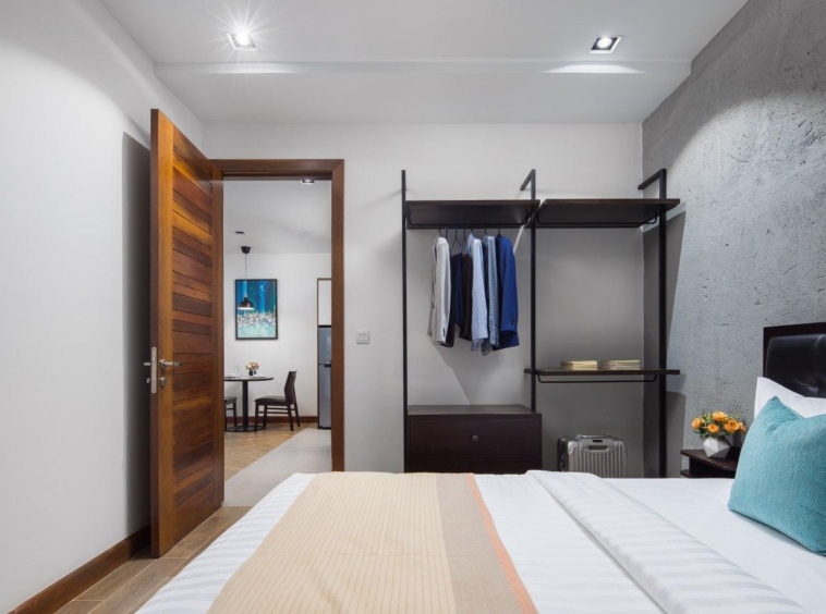 the bedroom of the 1br serviced apartment rental in Toul Tom Poung Phnom Penh Cambodia