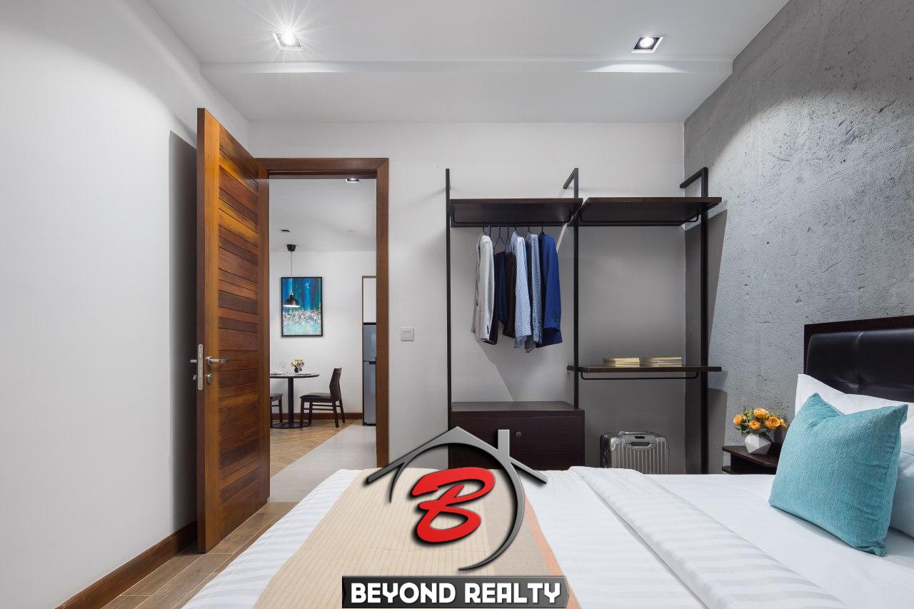 the bedroom of the 1br serviced apartment rental in Toul Tom Poung Phnom Penh Cambodia