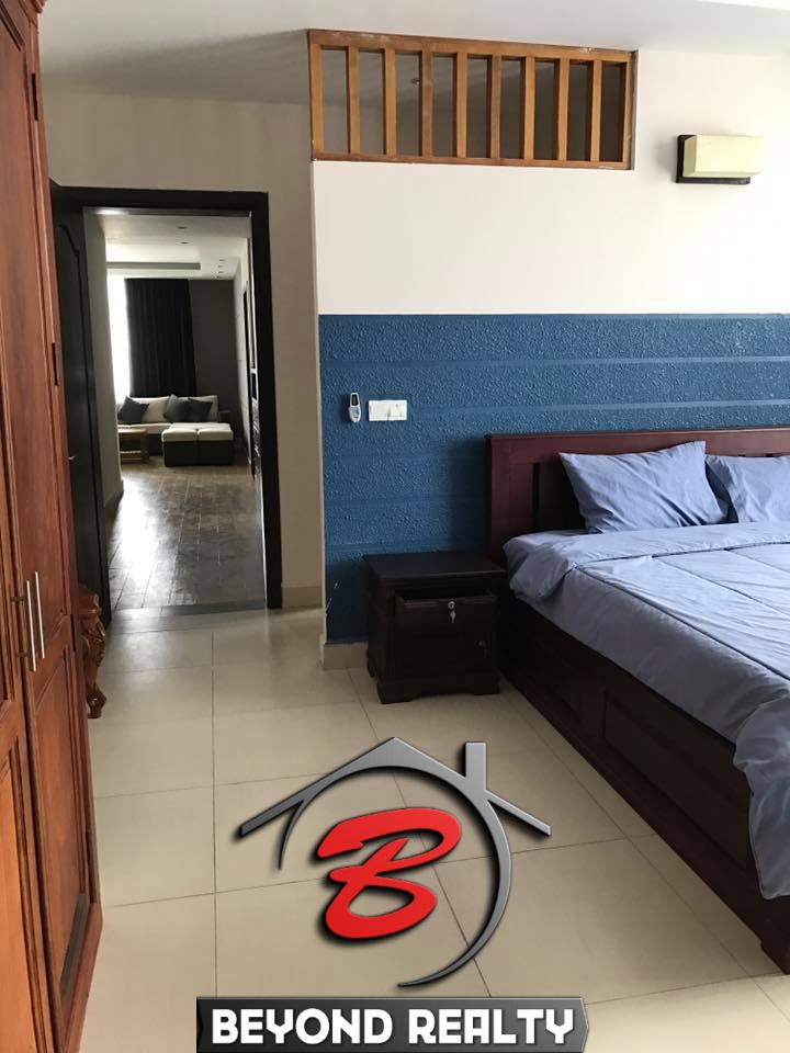 the bedroom of the 1-bedroom serviced apartment for rent in BKK1 in Phnom Penh Cambodia