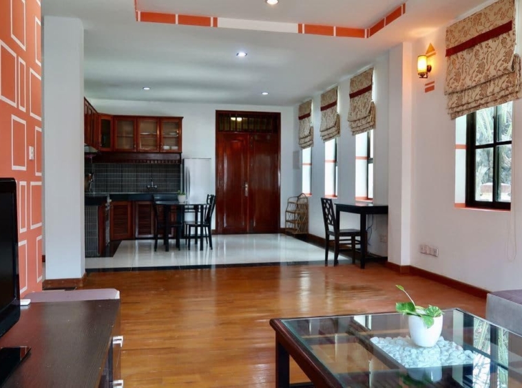 the living room and the kitchen of the 2-bedroom serviced apartment for rent near Wat Phnom in Daun penh in Phnom Penh Cambodia