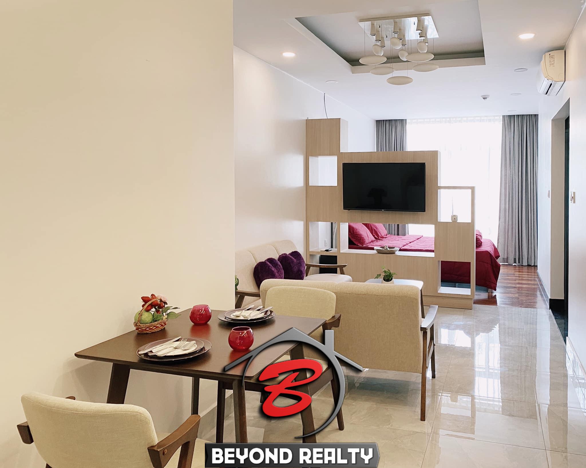 the living room of the studio apartment unit in the luxury serviced condo in Sangkat Srah Chak in Phnom Penh Cambodia