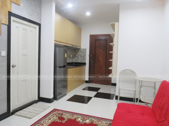 the living room of the 1-bedroom condo for sale in Toul Tom Poung Russian Market Phnom Penh