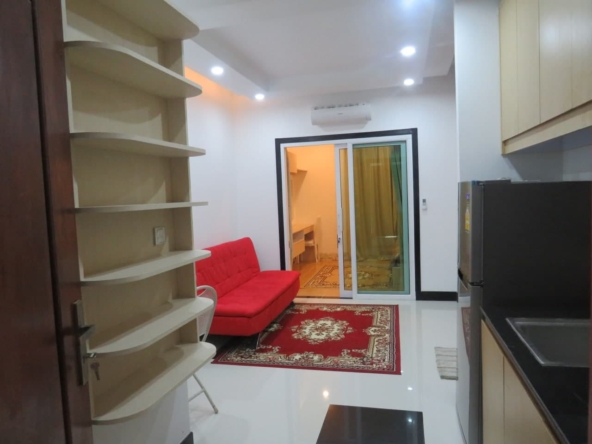 THE LIVING ROOM OF THE 1-bedroom condo for sale in Toul Tom Poung Russian Market Phnom Penh