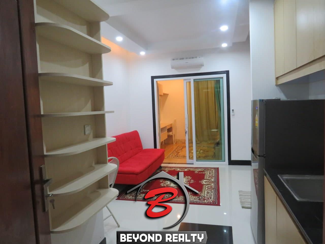 THE LIVING ROOM OF THE 1-bedroom condo for sale in Toul Tom Poung Russian Market Phnom Penh