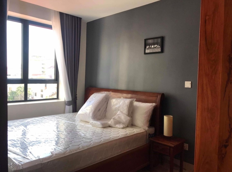 the bedroom of the 1-bedroom serviced apartment for rent in BKK3 in Phnom Penh Cambodia