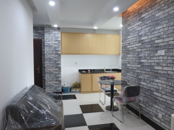the living room of the 1br condo for sale in Toul Tom Poung Russian Market Phnom Penh