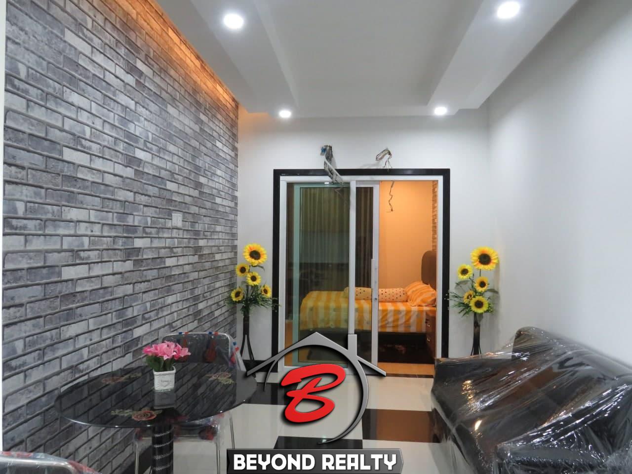 the living room of the 1br condo for sale in Toul Tom Poung Russian Market Phnom Penh