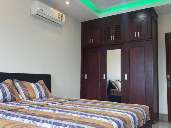 the bedroom of the 1br cozy serviced apartment for rent in BKK3 Phnom Penh Cambodia