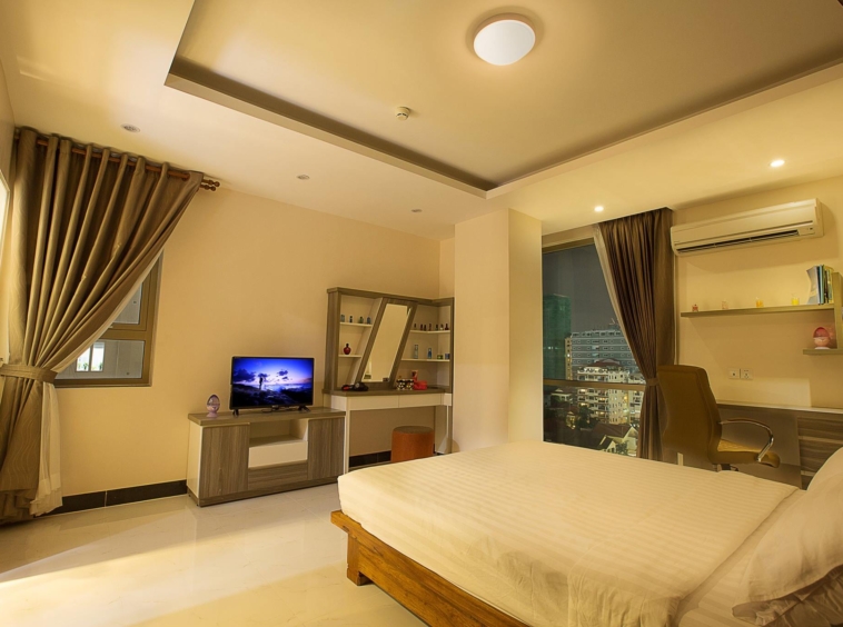 the bedroom of the 1br luxury serviced apartment for rent in BKK1 Phnom Penh Cambodia