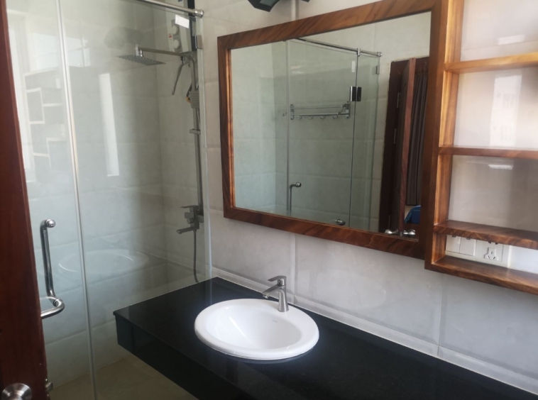 a bathroom of the 1br serviced apartment for rent in Toul Tom Poung Phnom Penh Cambodia