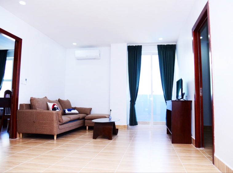 the living room of the 1br serviced apartment for rent in Toul Tom Poung near Mao Tse Boulevard in Phnom Penh Cambodia