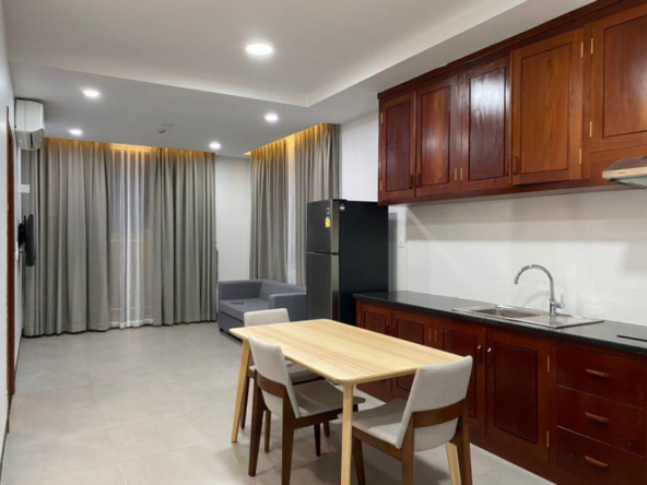 the kitchen and the living room of the 1br serviced flat rental in Tonle Bassac Phnom Penh Cambodia