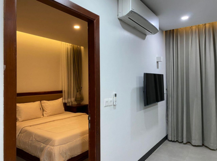 the bedroom of the 1br serviced flat rental in Tonle Bassac Phnom Penh Cambodia