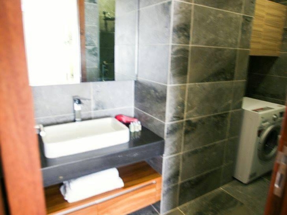 the bathroom of the 1br spacious luxury condo for sale (resale) at Aura Condominium in Daun Penh Phnom Penh Cambodia