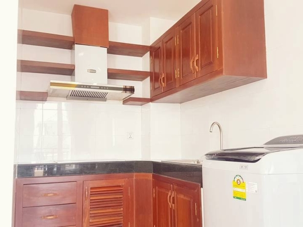 the kitchen of the 2-bedroom spacious serviced apartment rental in Toul Tom Poung
