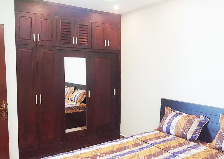 a bedroom of the 2br cozy serviced flat for rent in BKK3 Phnom Penh Cambodia