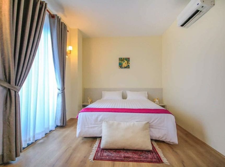 a bedroom of the Ratanak Apartment Phnom Penh