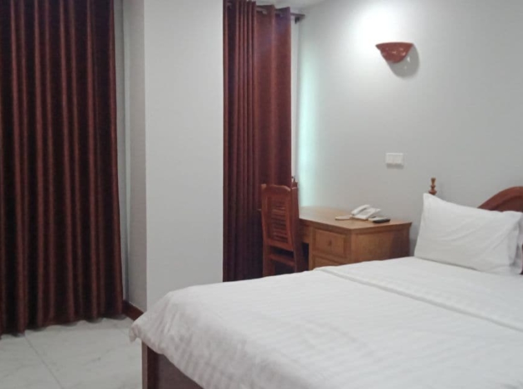 a bedroom of the 2br serviced apartment for rent in BKK3 in Phnom Penh Cambodia