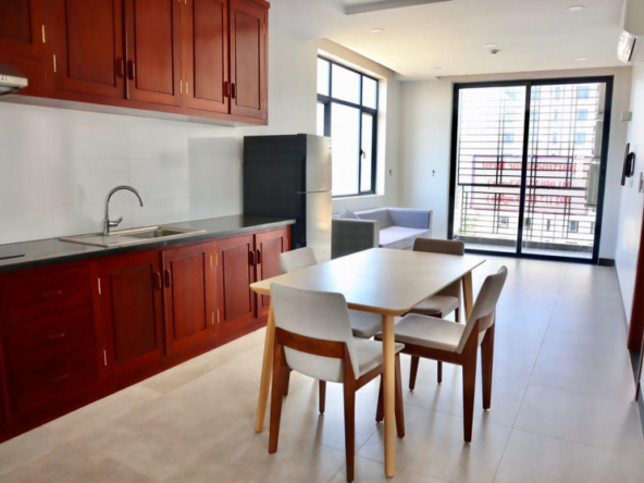 the kitchen and the living room of the 2br serviced apartment for rent in Tonle Bassac Phnom Penh Cambodia