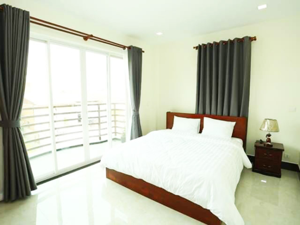 a bedroom of the 2br serviced rental flat in BKK2 Phnom Penh