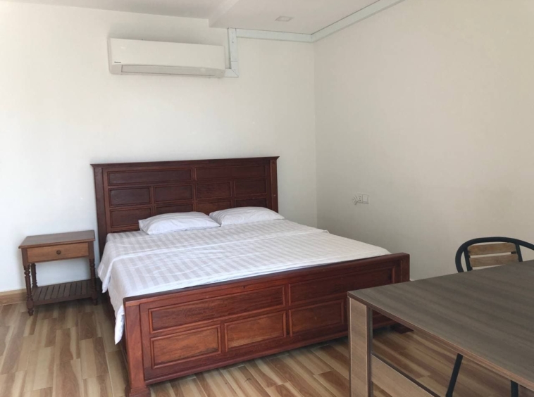 a bedroom of the 3-bedroom penthouse serviced apartment for rent in Tonle Bassac Phnom Penh Cambodia