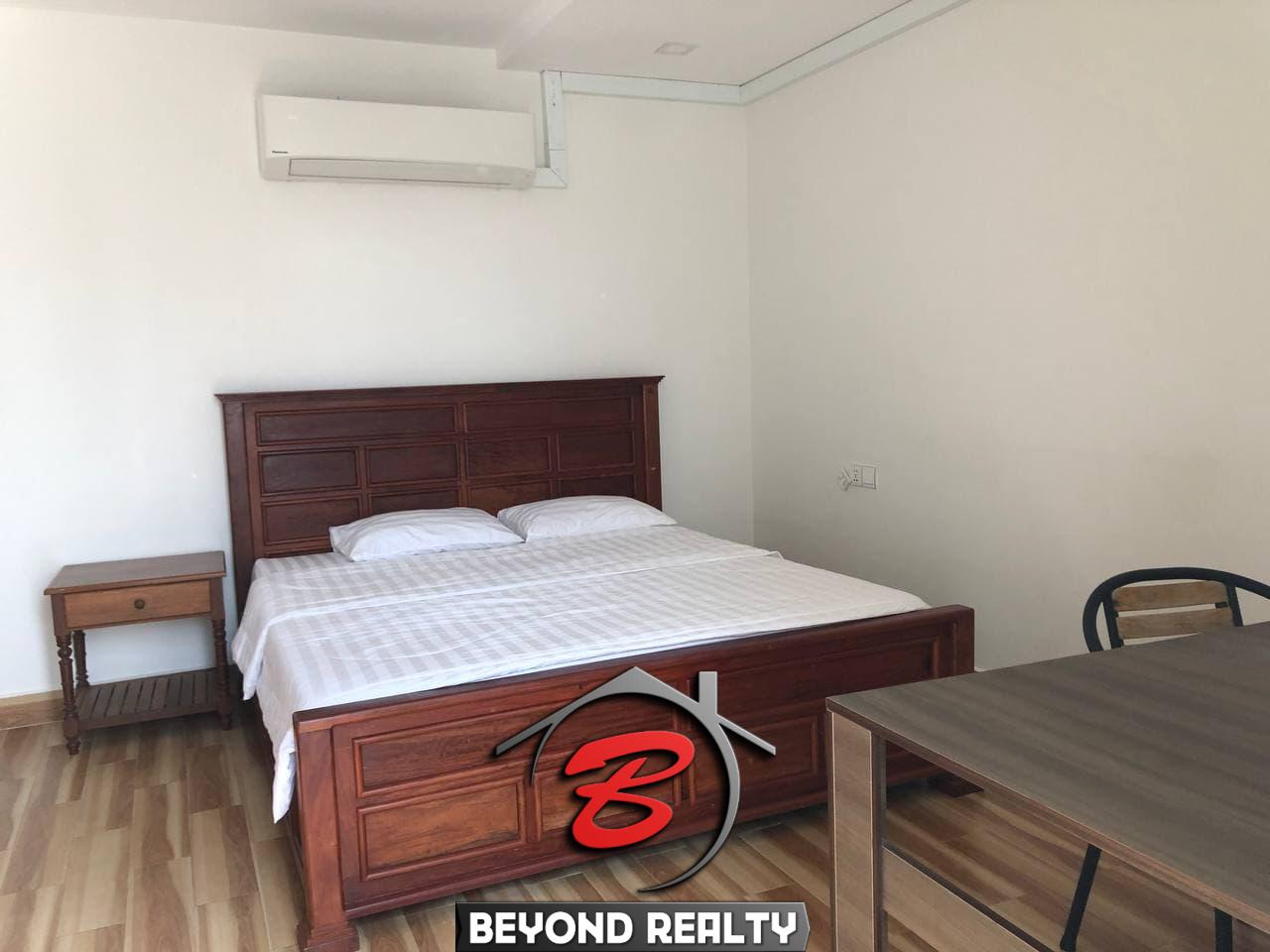 a bedroom of the 3-bedroom penthouse serviced apartment for rent in Tonle Bassac Phnom Penh Cambodia