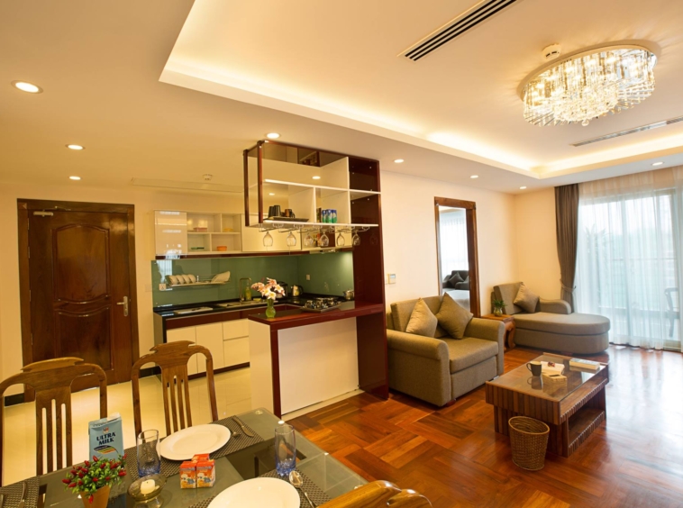 the kitchen and the living room of the luxury penthouse for rent in BKK1 Phnom Penh Cambodia