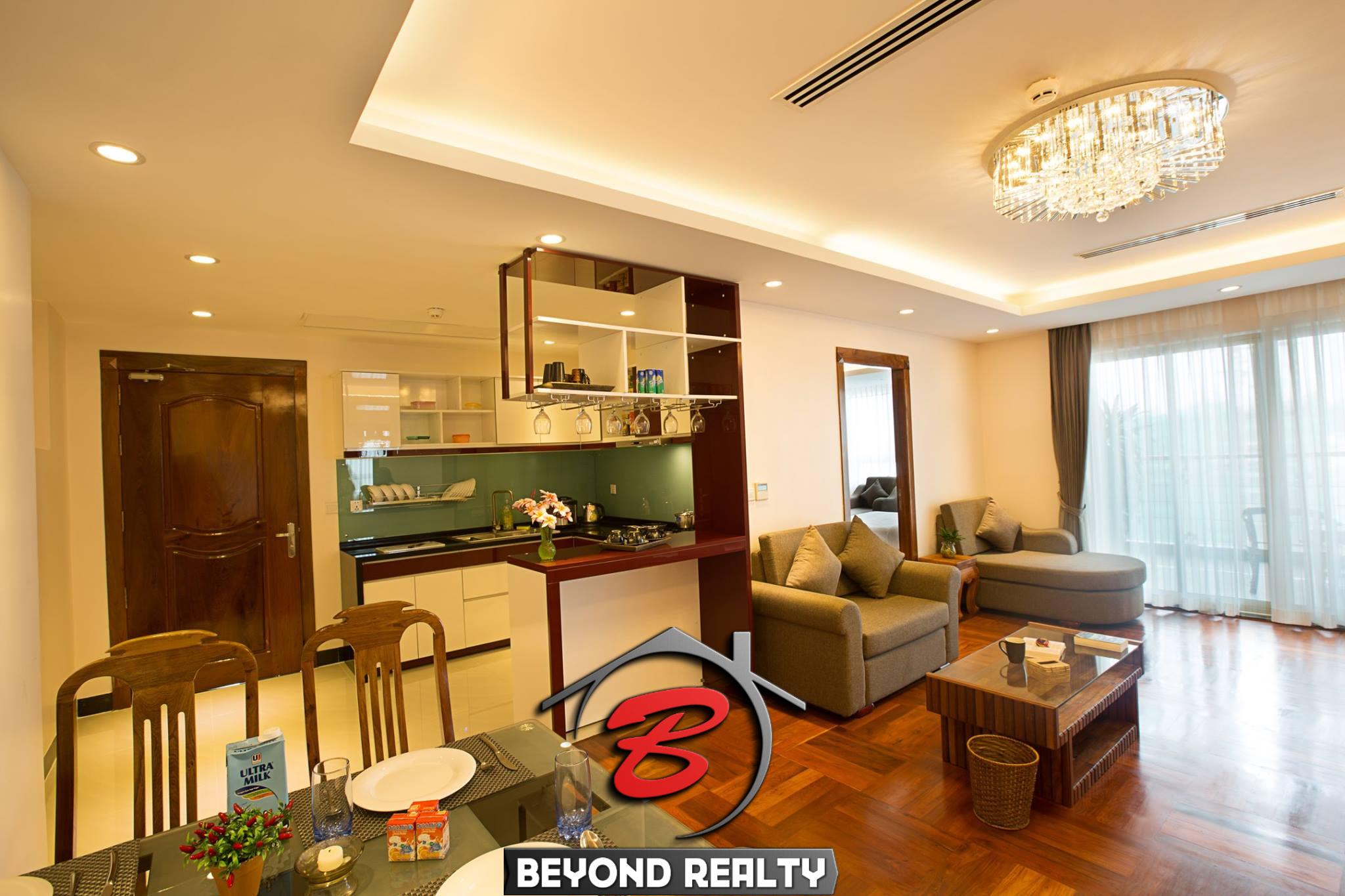 the kitchen and the living room of the luxury penthouse for rent in BKK1 Phnom Penh Cambodia