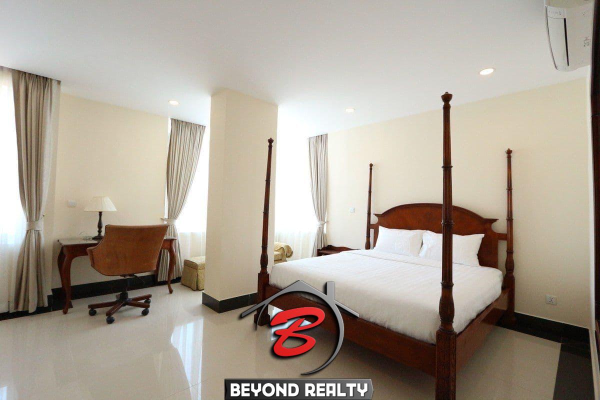 a bedroom of the 3-bedroom apartment for rent in BKK1 Phnom Penh Cambodia