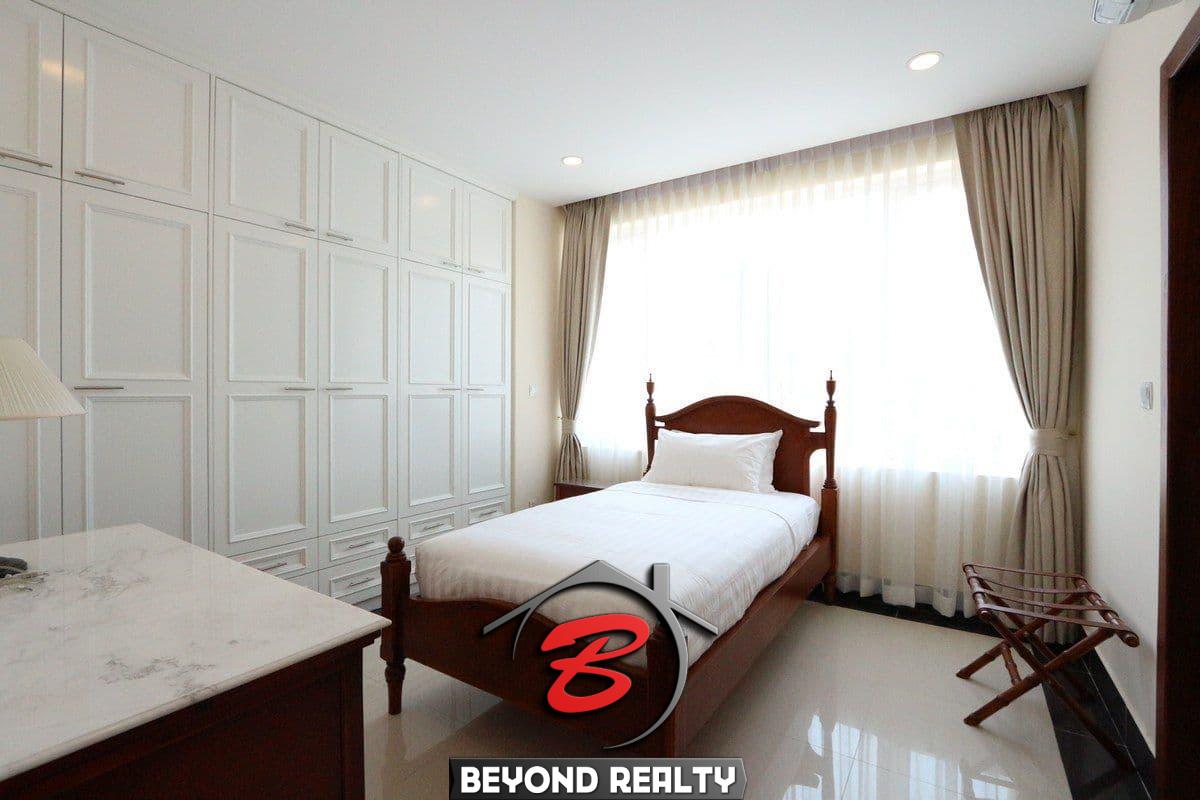 a bedroom of the 3-bedroom apartment for rent in BKK1 Phnom Penh Cambodia