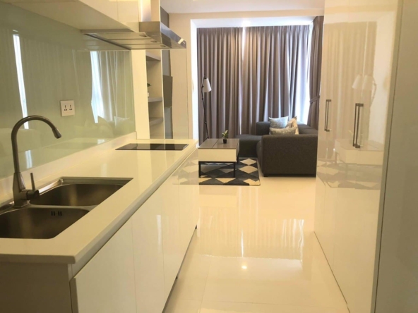 the kitchen and the living area of the studio apartment rental at st 63 in Tonle Bassac Phnom Penh
